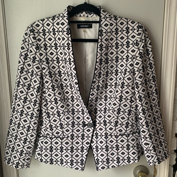 Black and white fitted blazer. Single button with asymmetrical hem. Medium.